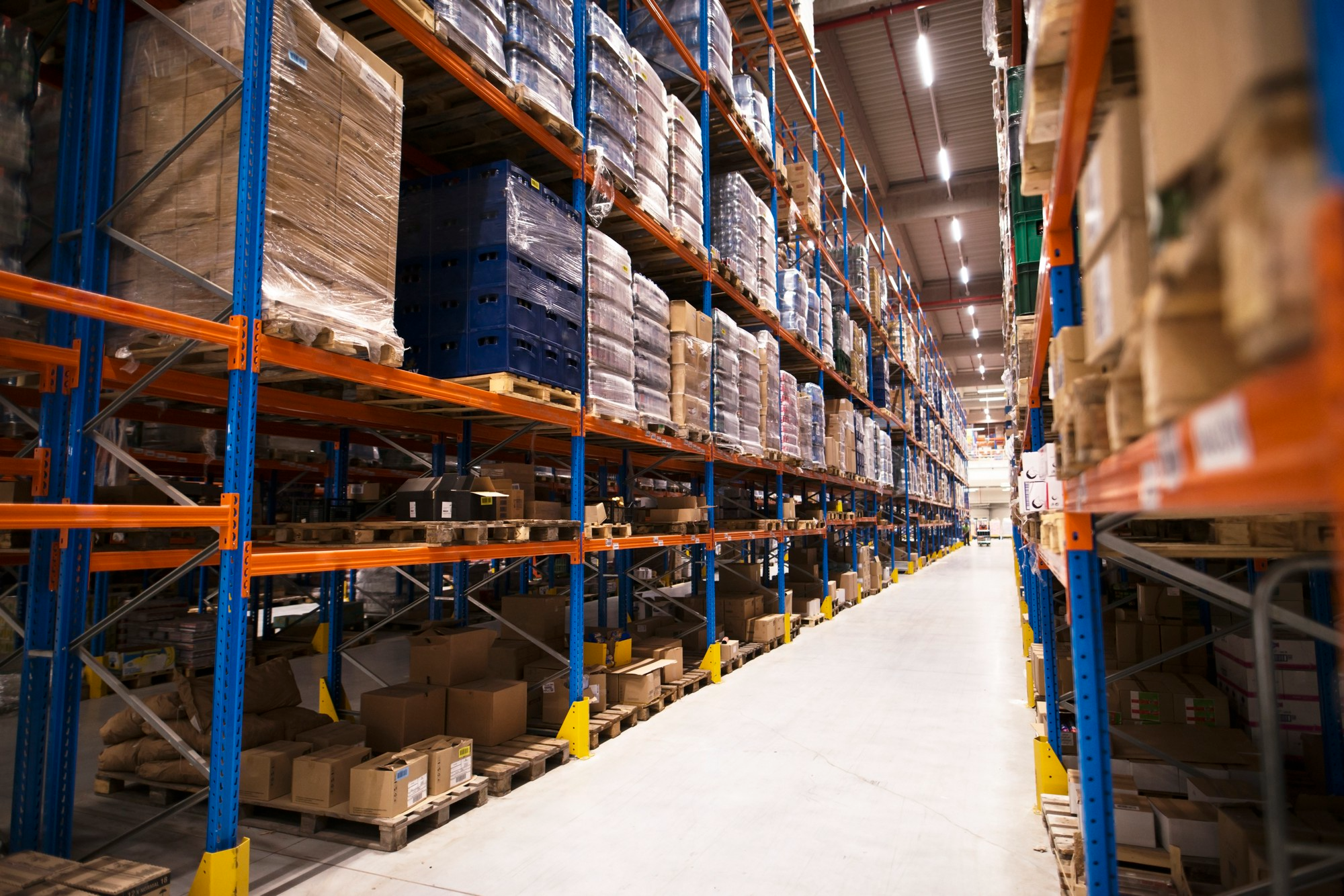 Warehouse and industrial facility with signal booster installation